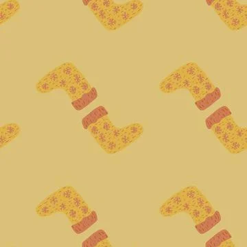 Decorative seamless pattern with orange colored christmas socks print. Pale p Stock Illustration