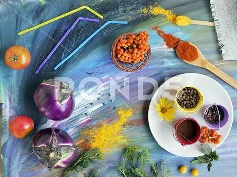 Decorative seasonal composition of vegetables, spices, fruits and flowers Stock Photos