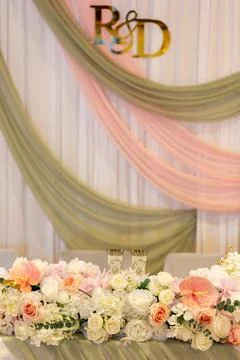 Decorative setup for R and D celebration with flowers and drapes in an indo.. Stock Photos