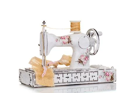 Decorative sewing machine on a white background Stock Photos