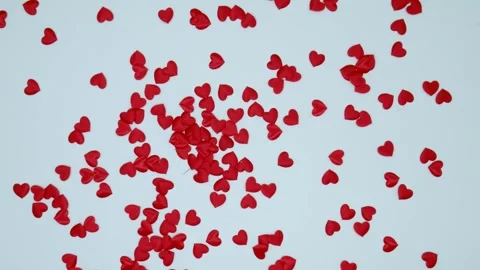 Decorative small red hearts spinning in circle on white background Stock Footage 312338540