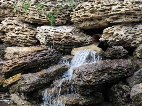 Decorative small waterfall in the park Foto stock