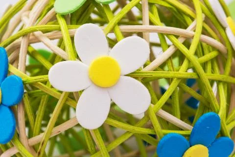 Decorative sphere made of bound wicker with florets Stock Photos