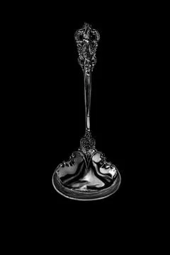 Decorative spoon on a dark background. the view from the top Stock Photos