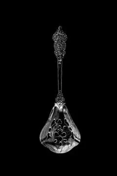 Decorative spoon on a dark background. the view from the top Stock Photos