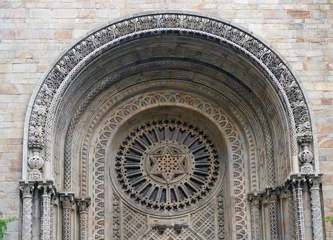 Decorative stone facade of an old synagogue, with Star of David Stock Photos