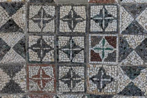 Decorative stone mosaic pavement pattern background with geometric star tiles 스톡 사진