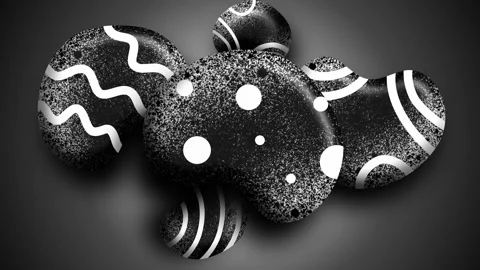 Decorative stone spheres with stripes and dotted playful patterns Stock Footage 321865291