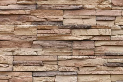 Decorative stone wall texture bacground pattern, natural color Stock Photos