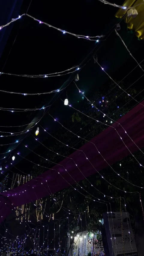 Decorative String Lights and Fabric Canopy at Night Stock Footage 334345755