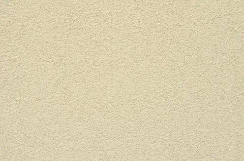 Decorative stucco wall of the house. Stock Photos
