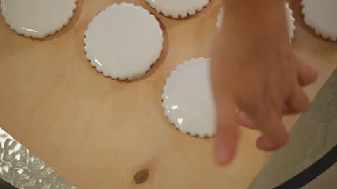 Decorative tartlets on board. Warm kitchen scene with freshly baked mini pies Stock Footage 346391373
