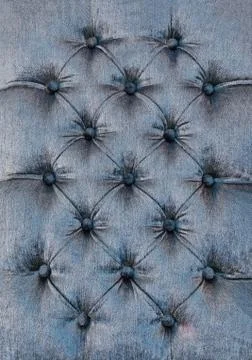 Decorative textile background with coach-type screed capitone chesterfield Stock-Fotos
