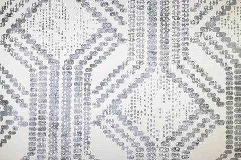 Decorative textile wallpaper background with hexagon style stitching Stock Photos
