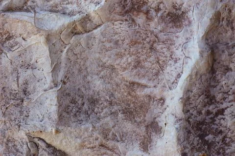 Decorative texture of the wall under the stone Stock Photos