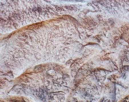 Decorative texture of the wall under the stone Stock Photos