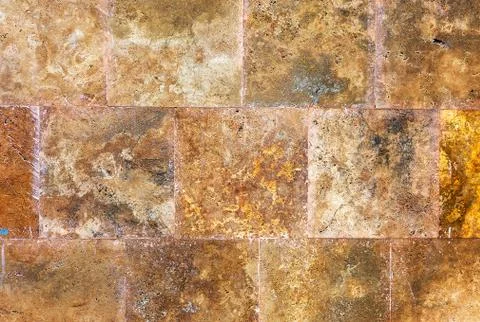 Decorative textured background wall of marble tiles Stock Photos