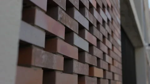 Decorative three dimensional brick facade on modern residential building 動画素材 342610990