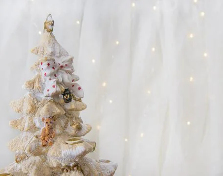 Decorative toy tree with decorations. Candlesticks, teddy bear Stock Photos