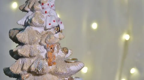 Decorative toy tree with decorations. Candlesticks, teddy bear Stock Photos