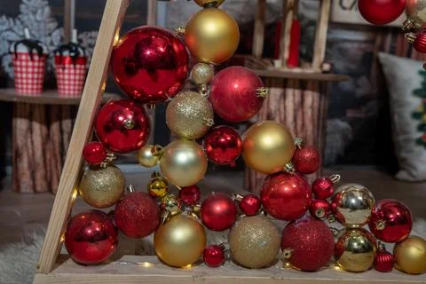 Decorative triangular Christmas tree of boards with balls 写真素材