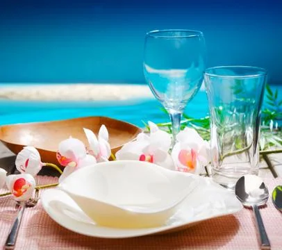 Decorative tropical table setting Stock Photos