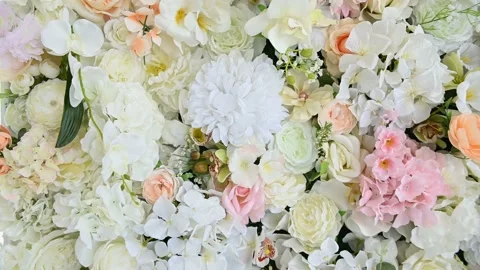 Decorative wall made of bright flowers of different types Stock Footage 135198112
