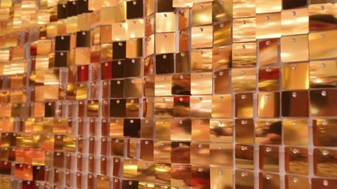 Decorative wall made of small reflective metallic tiles 動画素材 327633199