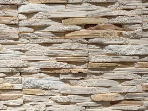 Decorative wall panels replicating brick stone and tile finishes arranged i.. Foto stock