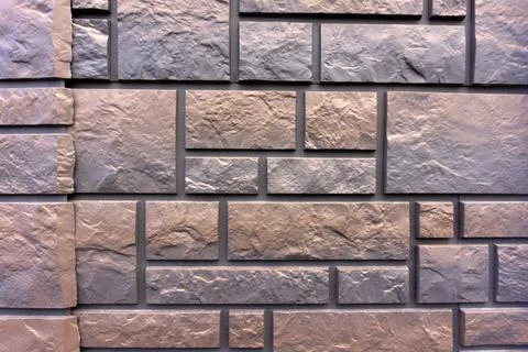 Decorative wall under a stone Background texture Stock Photos