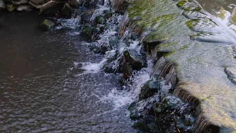Decorative waterfall on the river Stock Footage 109797808