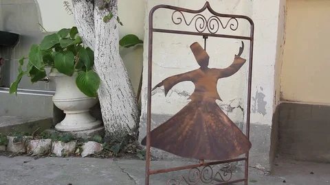 Decorative weathervane form whirling, dancing dervish, entrance dervishes temple Video stock 89303826