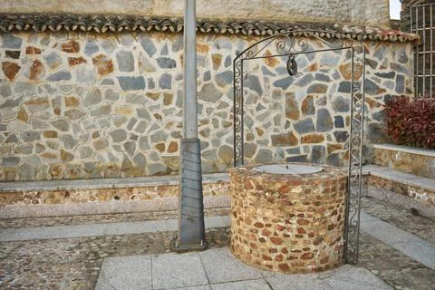 Decorative well for drawing underground water in a traditional way Stock Photos