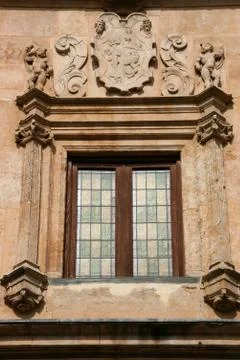 Decorative window in typical sandstone building in Salamanca, Spain Stock Photos