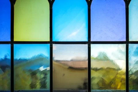 Decorative window with various colored rectangles stained glass Stock Photos