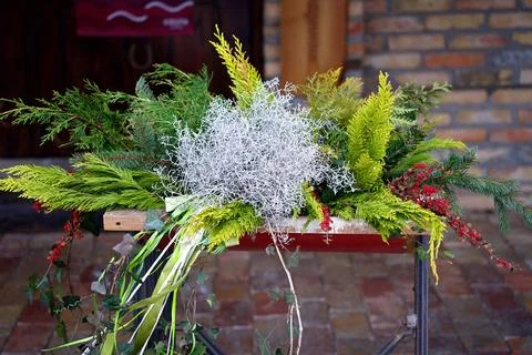 A decorative winter composition of coniferous branches,berries and other pl.. Stock Photos