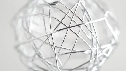 Decorative Wire Sphere, macro. Metal silver wire ball. Abstract silver meta.. Stock Footage 272434532