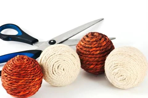 Decorative wool balls with scissors Stock Photos