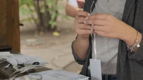 The decorator's hands are working on the decoration of the banquet hall Stock Footage 165820155