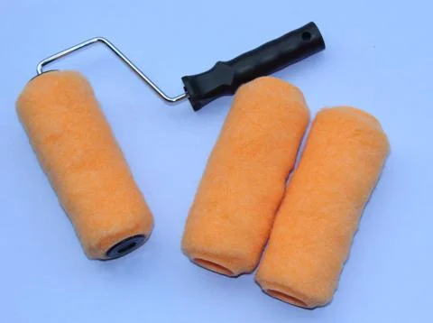 A decorators paint roller Stock Photos