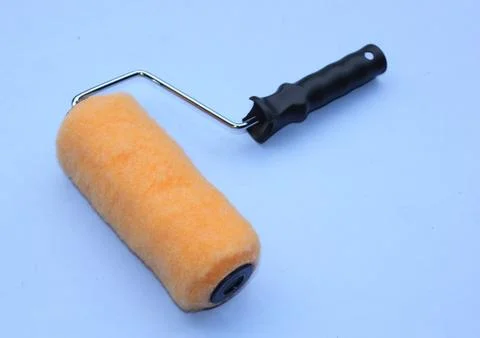 A decorators paint roller Stock Photos