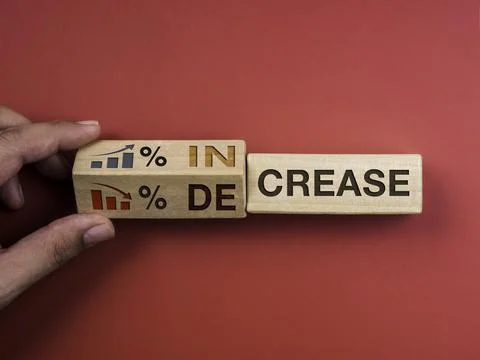 Decrease and increase percentage business concept. Words "INCREASE" on wooden Stock Photos