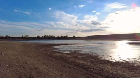 The decrease of lake water caused by drought, the lake water decreased a lo.. 스톡 동영상 286991806
