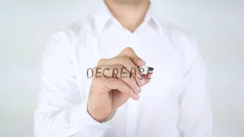 Decrease, Man Writing on Glass Stock Photos