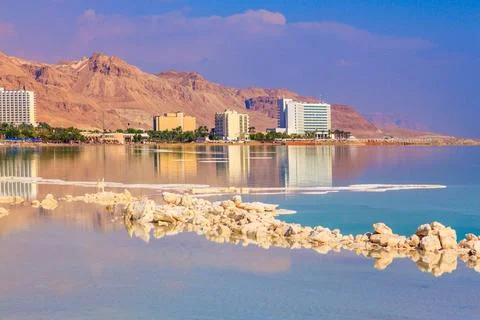 Decrease in water level The evaporated salt acts over a water surface beau... Stock Photos