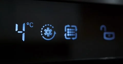 Decreasing the temperature on the digital display of kitchen refrigerator 库存影片 249757218
