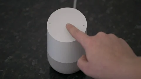 Decreasing the Volume On Smart Home Speaker Voice Assistant 库存影片 104118723