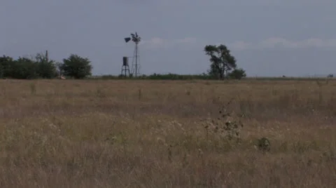 A decrepit windmill 2 in Texas Stock Footage 24693907