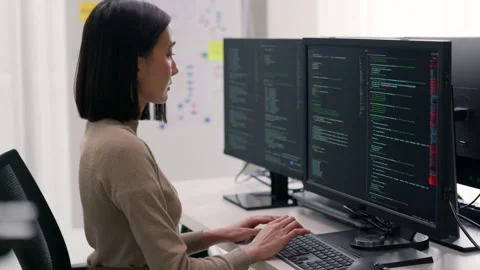Dedicated Asian Female Software Developer Working on Complex Code in Modern.. Stock Footage 300245920