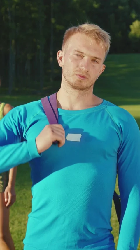 A dedicated athlete is intensely concentrating while dressed in sportswear Stock Footage 314956370